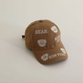 Detailed close-up of brown baseball cap featuring high-quality cartoon bear embroidery - 52-54cm (3-8 Years) / Coffee