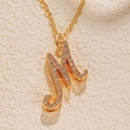 18K gold plated necklace featuring an elegant letter M pendant with sparkling zircons - Letter M