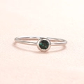 Minimalist stainless steel ring with round emerald green birthstone in a silver finish - US Size 7 / Steel-Green (May)
