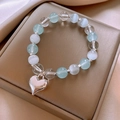 Light blue beaded bracelet with cat eye stones and silver heart charm pendant - Silver-Blue-Heart