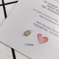 Macro detail of 11x6mm rhinestone jewelry connector with dual loops for DIY earrings - 6mm Double Loop 14K Gold