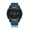 Detail view of teal digital sports watch with pedometer and alarm icons on LCD screen - Green-Blue Black Screen