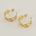Detailed macro view of gold-plated hollow line hoop earrings with small bead decorations - Gold