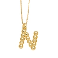 Polished gold initial N pendant necklace featuring a unique beaded sphere design - Letter N