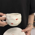 Handcrafted white ceramic coffee cup and saucer with red heart pattern and irregular shape - Gold Interlocking Double Heart