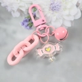 Nahaufnahme von rosa Schlüsselanhänger mit Acryl-Bonbonanhänger und Gliederkette - 5126-6 Rosa Herzbonbon