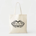 Close-up of cream canvas tote bag featuring black bat prints and Melissa text detail - 35cmx40cm / Melissa Bats Style