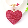 Llavero de corazón rosa con pedrería, cadena dorada y detalle de borla a juego - Oro & Rosa Fucsia