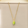Detail of yellow dragon fruit pendant with green accents on a golden stainless steel chain - Yellow Dragon Fruit Style (KN292117-Z)