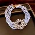 Multi-layer faux pearl necklace with floral rhinestone pendant and gold toggle clasp - Gold White Multi-layer Pearl Flower Necklace