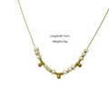 Collana di perle dorate con perle bianche irregolari e parametri taglia 40+5cm - 40+5cm / Collana di perle dorate