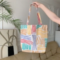 Canvas tote with colorful stripes and snap button closure for casual daily commuting - Shoulder Style