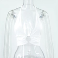 Detail view of white halter crop top with V-neckline and decorative silver metal ring - S / White