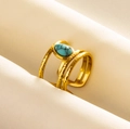 Detail of vintage gold hammered ring featuring a textured band and turquoise stone - Gold - Light Blue Faux Stone