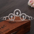 Detail of silver rhinestone princess crown with large gems on a vintage wooden box - Style 1 (Wave Heart-Silver)