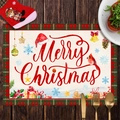 Merry Christmas placemat with red plaid border and festive icons on a wooden table - CD30-14
