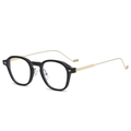 Classic black and gold round frame glasses with retro metal temples in 3/4 view - Shiny Black Gold