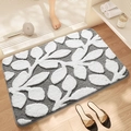 Grey rectangular bathroom rug with white leaf pattern on wooden floor - 40*60cm / Leafy-Gray