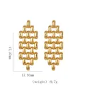 Detail view of 18k gold plated geometric drop earrings showing 47mm length dimensions - Geometric Interlocking Oval Earrings