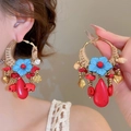 Close-up of bohemian hoop earrings with blue flowers and woven beige rope details - Silver Earring Post Style / Gold-Coffee-Red