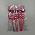 Close-up of 6-pack pink disco mirror ball spiral straws in clear plastic packaging - 6 Pcs/Bag / Pink