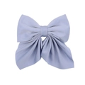 Detail of a large light blue fabric bow hair clip with smooth matte texture and premium finish - Light Blue