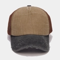 Detail of vintage washed trucker hat featuring a distressed brim and breathable mesh - Khaki and Black