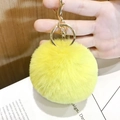 Plush yellow faux fur heart keychain with golden metal ring and swivel clasp detail - Small Yellow Pom Pom
