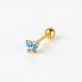Close-up of gold flower cartilage stud with four blue zircons and a screw ball back - Cross Flower Shape / Blue Zircon