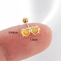 Macro shot of gold double heart cartilage stud on fingertip showing 1.0cm width scale - Gold-Yellow Heart