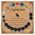 Capricorn beaded zodiac bracelet with natural stones and gold Saturn charm on kraft card - Capricorn