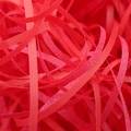 Vibrant red shredded paper filler for gift boxes with matte texture and decorative finish - 100g/Pack / PT11 Red Glitter