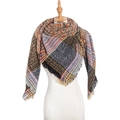 Multicolor plaid knit triangle scarf with tassel trim on a mannequin model - Fine Plaid Yellow