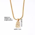 Detail shot of a gold bear pendant necklace with 60cm snake chain and 2.5cm zircon charm - Bear Style