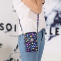 Vertical blue nylon crossbody phone bag with colorful star prints and adjustable strap - Blue Little Star