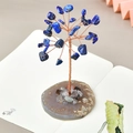 Handmade crystal tree with blue lapis lazuli leaves and a natural agate base - Lapis Lazuli