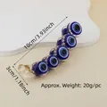 Detail of evil eye hair claw clip with size dimensions 10cm and weight 20g - 10cm 5-Round Eye Banana Clip