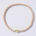 Elastic beaded bracelet featuring round golden beads and small pink spacer accents - Light Pink and Gold