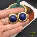 Detailed close-up of blue lapis lazuli earrings with gold frame, 20mm size and 15g weight - FM1054 Stud Earrings