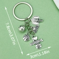 Silver metal basketball keychain with hoop and ball charms and size measurements - Basketball Hoop Sports