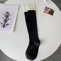 Chaussettes hautes en tricot noir et blanc avec revers larges à bords-côtes - Poignet Blanc