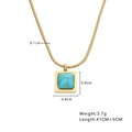 Detail view of turquoise pendant on golden snake chain with precise measurements - Gold