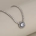 Tennis chain necklace with a large round cubic zirconia center and silver finish - Round Pendant / Silver