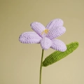 Handmade crochet tulip flower in light purple yarn with green stem and leaf - Purple