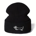 Black knit beanie with embroidered dachshund pattern for winter warmth and casual style - One Size / Black