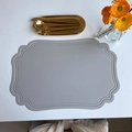 Light gray oval leather placemat with beaded edge on table, vintage European style - Embossed Irregular Beige Grey