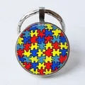 Round metal keychain with colorful autism awareness puzzle pattern and silver ring - Colorful Puzzle/Autism Awareness
