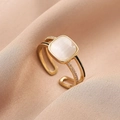 Elegant gold-tone adjustable ring with square white cat eye stone and pavé accents - Adjustable Open / Square Cat Eye Stone Style (J2469)