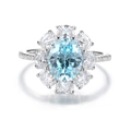 Elegant S925 sterling silver ring with oval sky blue gemstone and diamond halo - Sky Blue (CBJZ439)