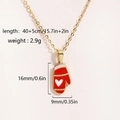 Detail showing weight and dimensions of a gold necklace with a red enamel glove charm - Red Heart Glove